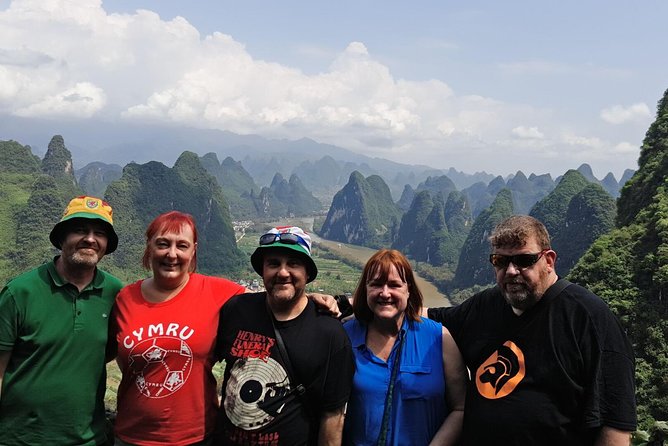 1-Day Guilin Tour to Reed Flute Cave, Xianggong Hill, Bamboo Boat and Night Show - A short walk through Yangshuo West Street