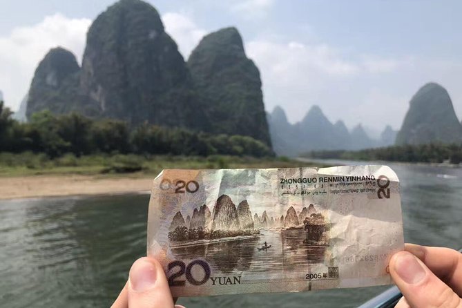 1-Day Guilin Tour to Reed Flute Cave, Xianggong Hill, Bamboo Boat and Night Show - Reed Flute Cave, Guilin’s colorful first stop