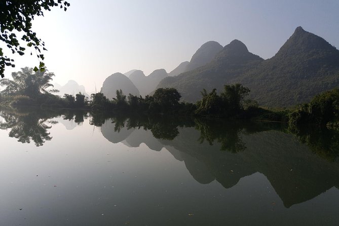 1 Day Yangshuo Countryside Cycling and Yulong bamboo boat Private Tour - Cycling through Yangshuo’s rice fields