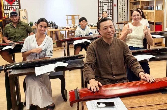 Beijing Culture: Tea Ceremony, Heritage Instrument & Calligraphy - Traditional clothing and a more personal photo