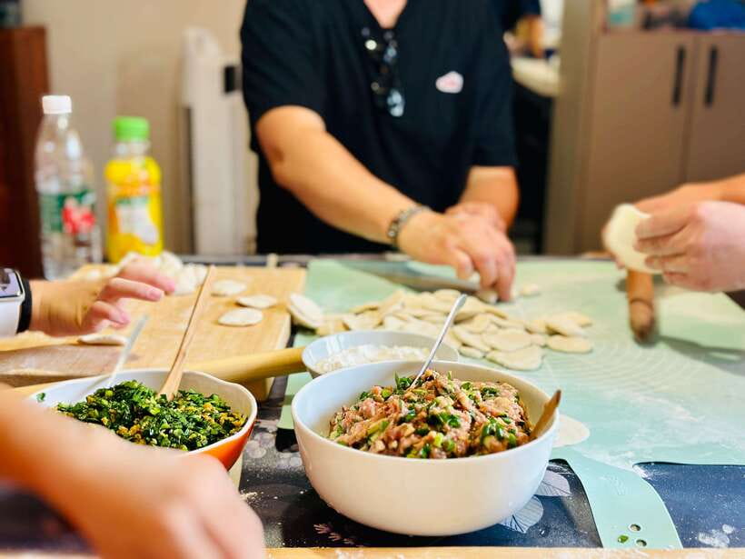 Beijing: Dumpling-Making Class with wet Market visit - Folding dumplings without making a mess