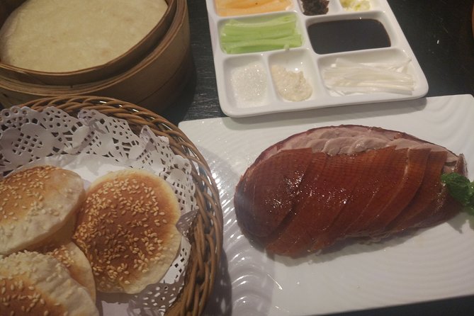 Beijing Evening Tour: Chaoyang Acrobatic Show with Peking Duck Dinner - Two Beijing traditions in one short evening