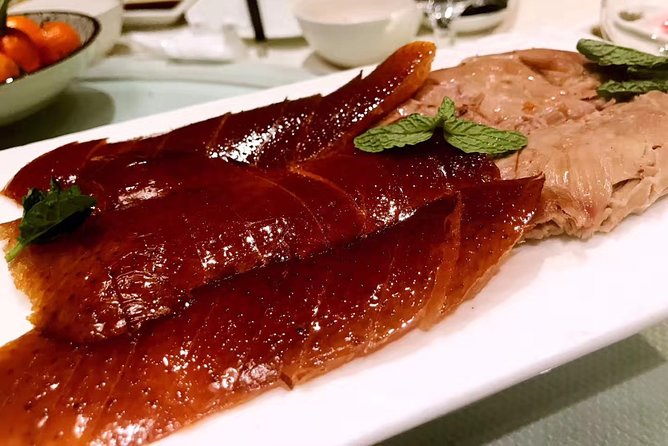 Beijing Evening Tour: Chaoyang Acrobatic Show with Peking Duck Dinner - The acrobatics: skill, speed, and a short running time