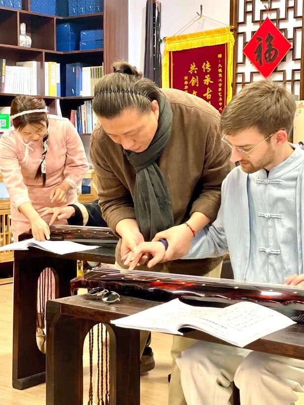 Beijing Hands-On Culture Tour: Tea, Instrument, Calligraphy - Guqin lesson: pluck the oldest sound in the room