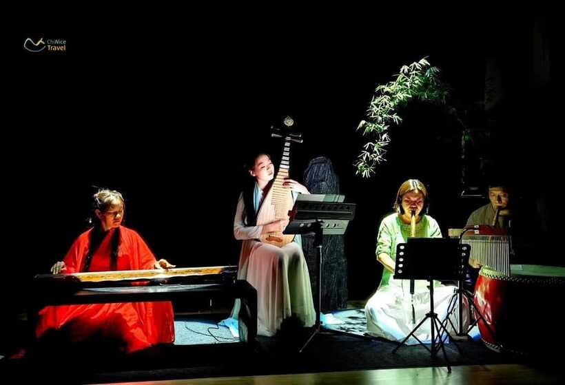 Beijing Hands-On Culture Tour: Tea, Instrument, Calligraphy - Hanfu, photographs, and a souvenir with a story