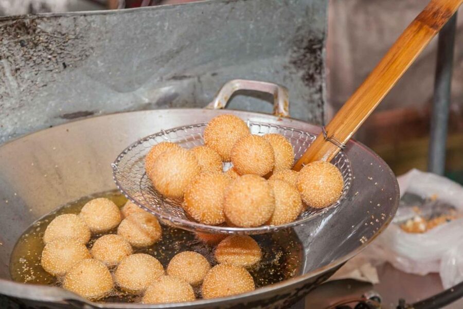 Beijing: Hutong Culinary Walking Tour with 15+ Tastings - Sesame cakes, fried twists, and sweet snacks