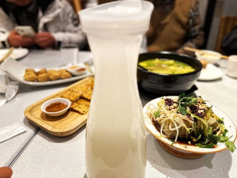 Beijing Hutong Food Crawl Delights: Peking duck, Hotpot&More - Group size, private tours, and hotel pickup