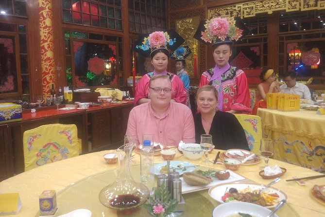 Beijing Imperial Dining Experience at Bai Jia Da Yuan Restaurant with Houhai Lake Bar Tour - Walking through Houhai’s lakeside bar district