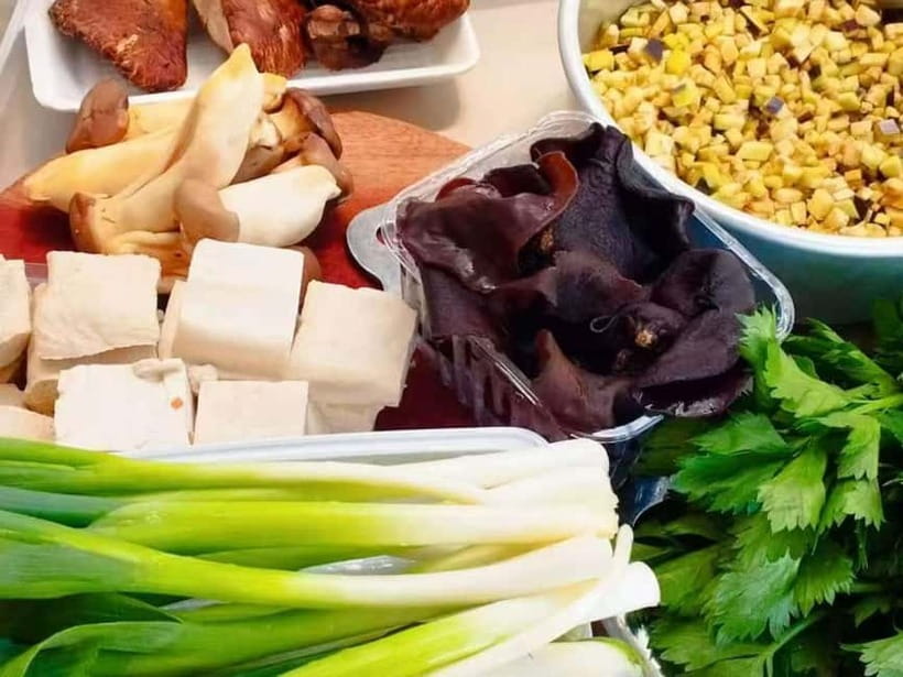 Beijing: Vegan Home Cooking & Local Market Tour with Sanxia - Cooking dumplings, noodles, buns, and seasonal dishes