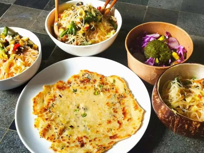 Beijing: Vegan Home Cooking & Local Market Tour with Sanxia - Sitting down to eat what you made