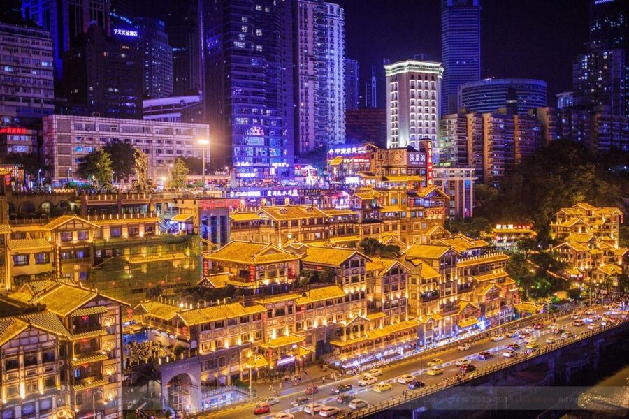 Chongqing: Illuminated Night Tour with Cruise or Hot Pot - Jiefangbei begins the evening in central Chongqing