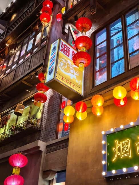 Chongqing: Trendy Spots, Cableway & Ferry Private Tour - Longmenhao Old Street and the riverbank’s new life