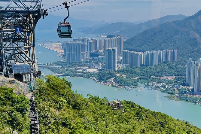 Coach Day Tour - Lantau Island Visiting and Giant Buddha Cable Car Tour Plus Tai O Boat Ride - Tai O by boat, with stilt houses and possible dolphins