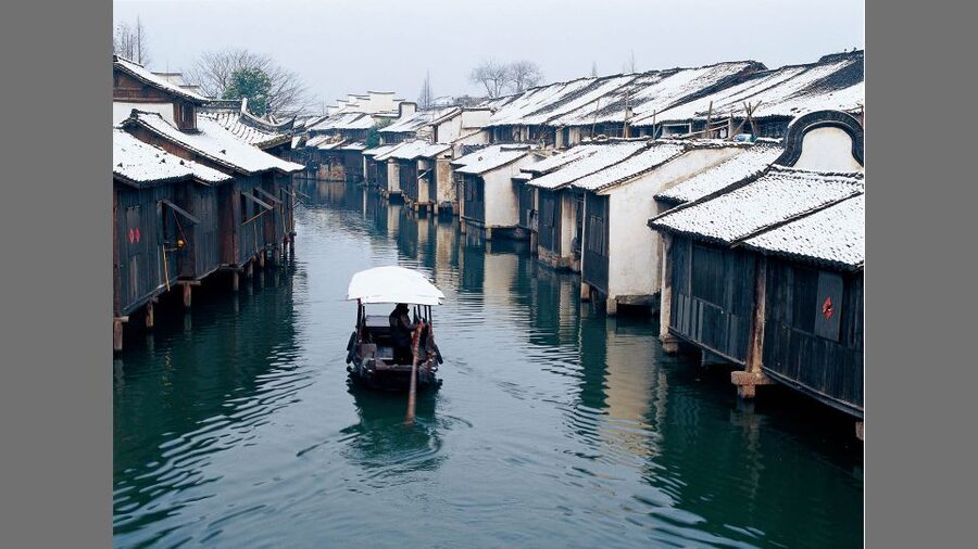 Delve into Wuzhen Water Town: Private Tour from Shanghai - Crossing into Xi Zha, the West Gate