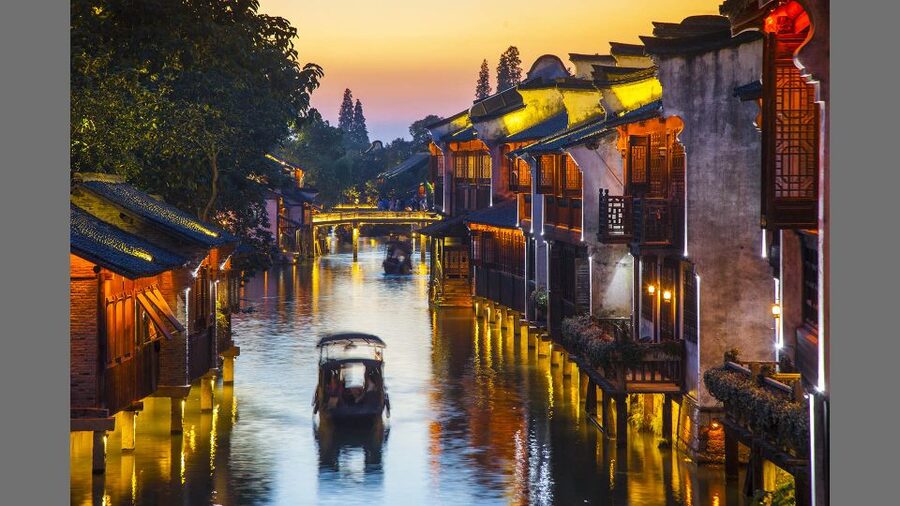 Delve into Wuzhen Water Town: Private Tour from Shanghai - Sunset, old bridges, and the best time for photos