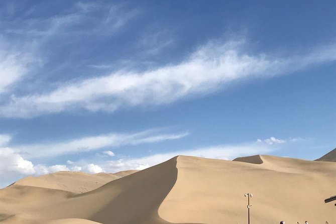Dunhuang Private Day Tour Mogao Grottoes, Singing Dunes and Crescent Moon Spring - Why the Mogao Caves deserve the morning