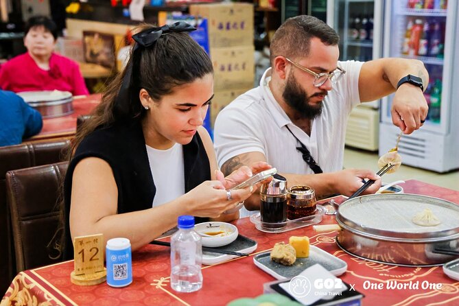 Experience Beijing Walking Food Tour Private - Sweet stops: candied mulberries, crepes, and local dessert