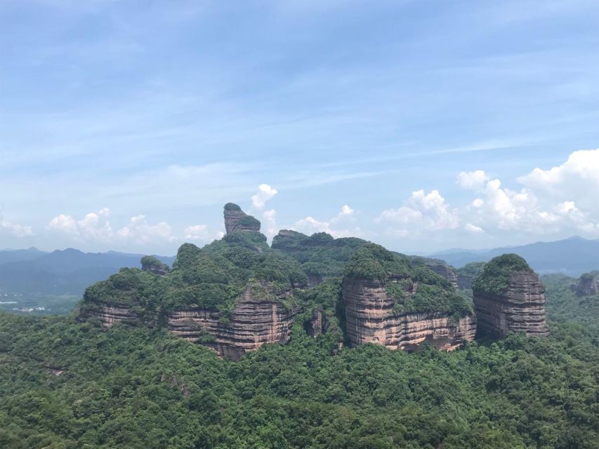 From Guangzhou: Mount Danxia and Nanhua Temple Full-Day - Yang Yuan Stone, nature with a sense of humor