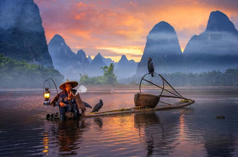Guilin: 1-Day Iconic Landmarks & Cultural Tour - Reed Flute Cave turns karst into a light show