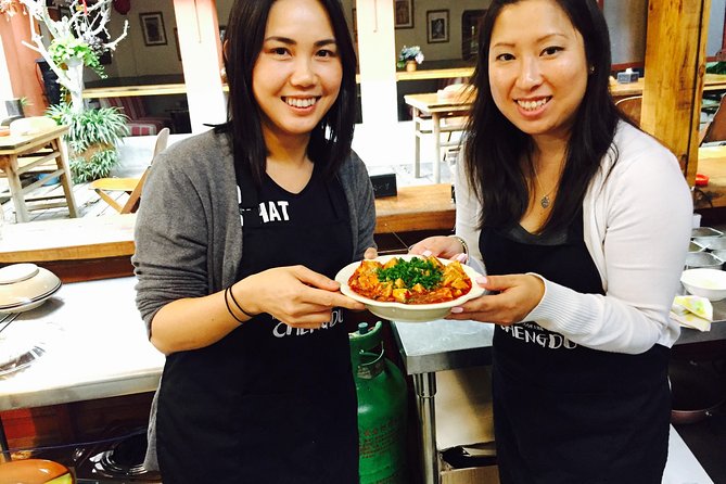 Half-Day Professional Mapo Tofu Cooking with a Local Market Visit - Sitting down to eat what you prepared