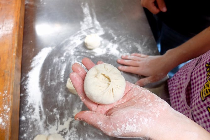 Half-Day steamed Buns Cooking Class with a Local Market Visit - Stop 2: Chilli Cool’s traditional courtyard kitchen