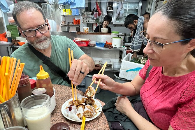 Hong Kong Private Food Tour with Michelin Street Food - Graham Street Market, old streets beneath tall buildings