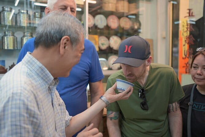 Hong Kong Street Food Tour with Locals - Dim Sum, Wonton & more - Sheung Wan’s milk tea and postwar comfort food