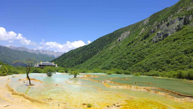 Huanglong Scenic Area: Explore Stunning Five-Colored Ponds - What the cableway and sightseeing bus add