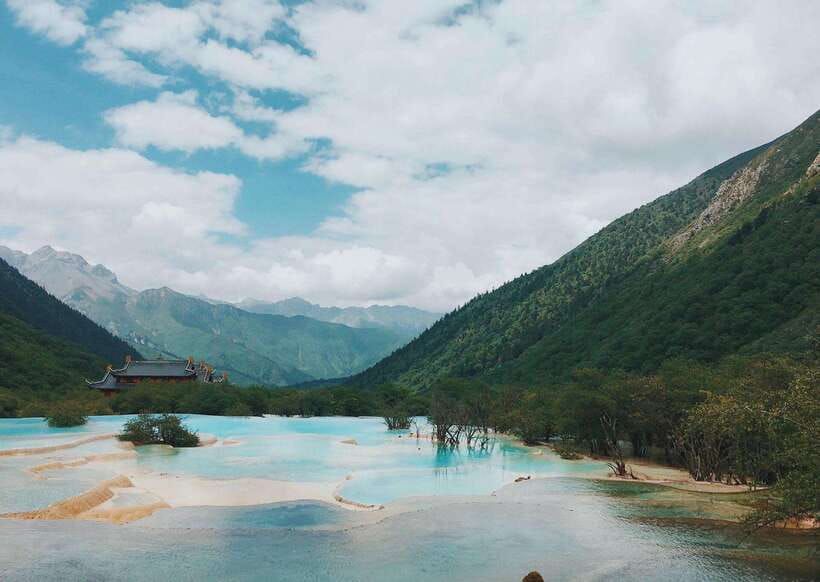 Huanglong Scenic Area: Explore Stunning Five-Colored Ponds - Service, communication, and booking support