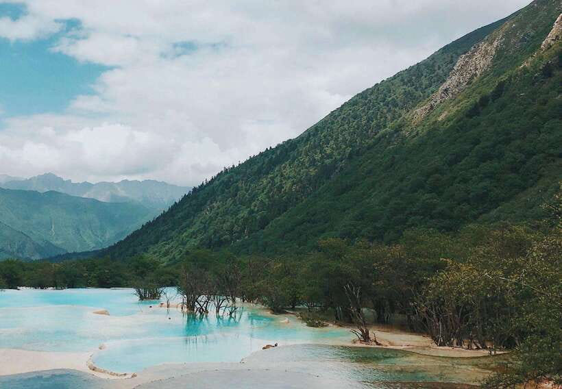 Huanglong Scenic Area: Explore Stunning Five-Colored Ponds - Who will enjoy this day most