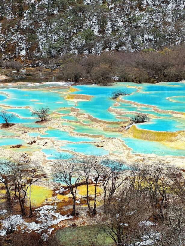 Huanglong Scenic Area: Explore Stunning Five-Colored Ponds - The six-hour route through Huanglong Valley
