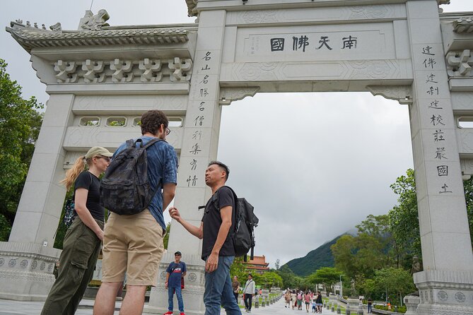Lantau Island Day Trip Big Buddha & Tai O Includes Cable Car - Climbing the 268 steps to the Big Buddha