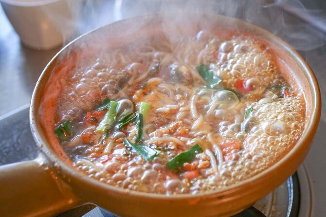 Lijiang Naxi Cuisine Cooking Class & Market Visit - Two hours at the stove, with three dishes to prepare