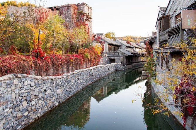 Lock Your Love on Simatai Great Wall with Gubei Water Town Visit and Cable Car Ride - Attaching your lock above the wall