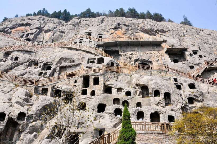 Louyang Day Tour from Xian: Longmen Grottoes, Shaolin Temple - Walking through Longmen Grottoes