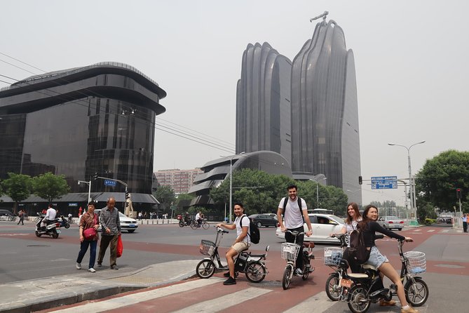 Modern Beijing Discovery by Bike - The Place and its giant overhead screen