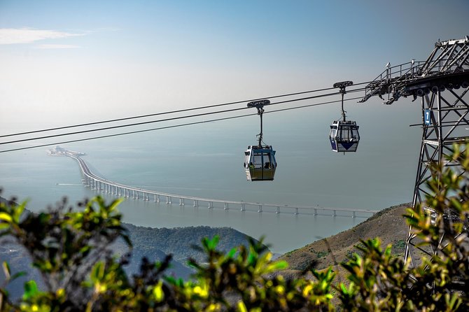 Ngong Ping 360 Skip-the-Line Private Crystal Cabin Ticket - Approaching Ngong Ping Village and the Big Buddha