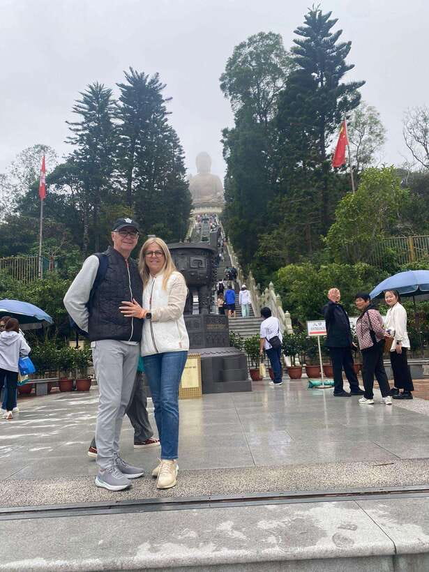 Premium Lantau Tour with Cable Car tickets & English Guide - Climbing the 268 steps to the Big Buddha