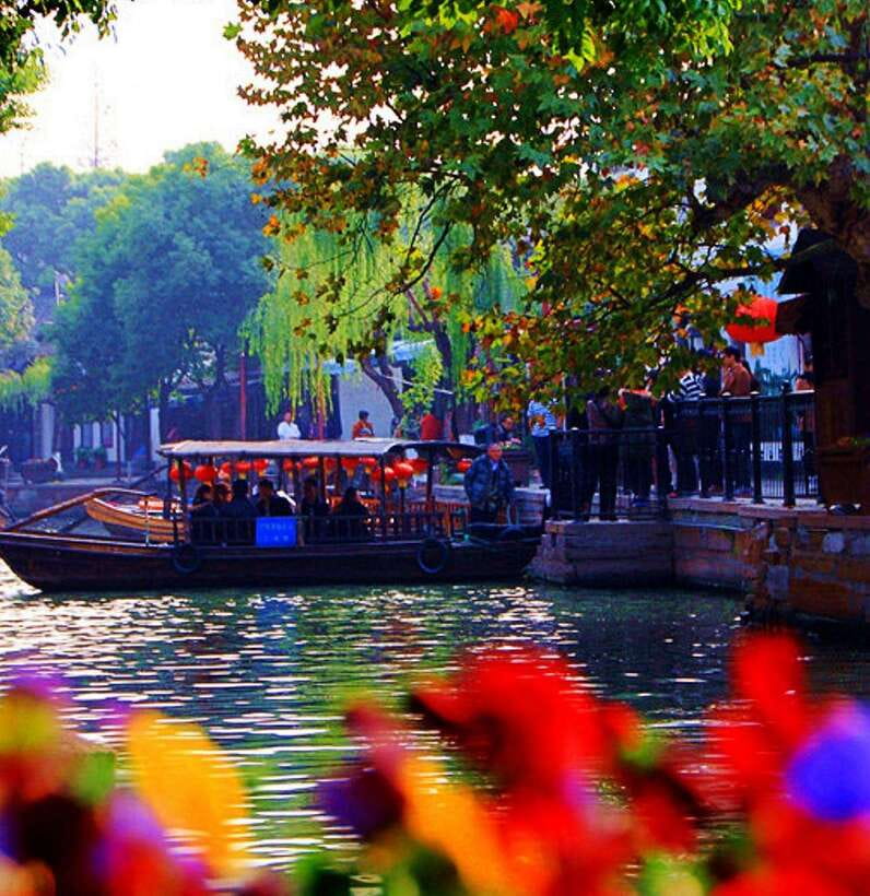 Private Tour:Zhujiajiao Water Town by German-Speaking Guide - Stone lanes and old water markets