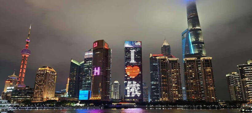 Shanghai: After Dark Dinner and Huangpu River Night Cruise - What the guide adds to the experience