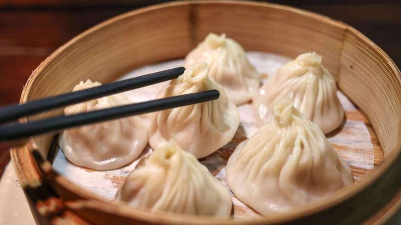 Shanghai: Evening Walking Food Tour - Shanghai’s carbs, from noodles to pan-fried buns