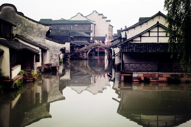 Wuzhen Water Town Delight Tour With Riverside Lunch Experience - Wuzhen’s canals and six thousand years of history